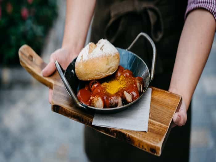 Sausage in a pan with bread