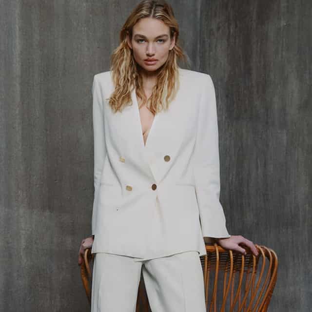Alberta Ferretti brand image, a woman with a white suit