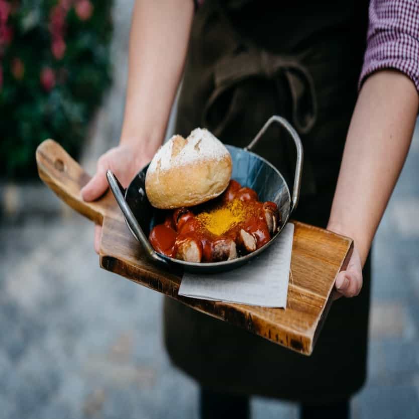 Sausage in a pan with bread