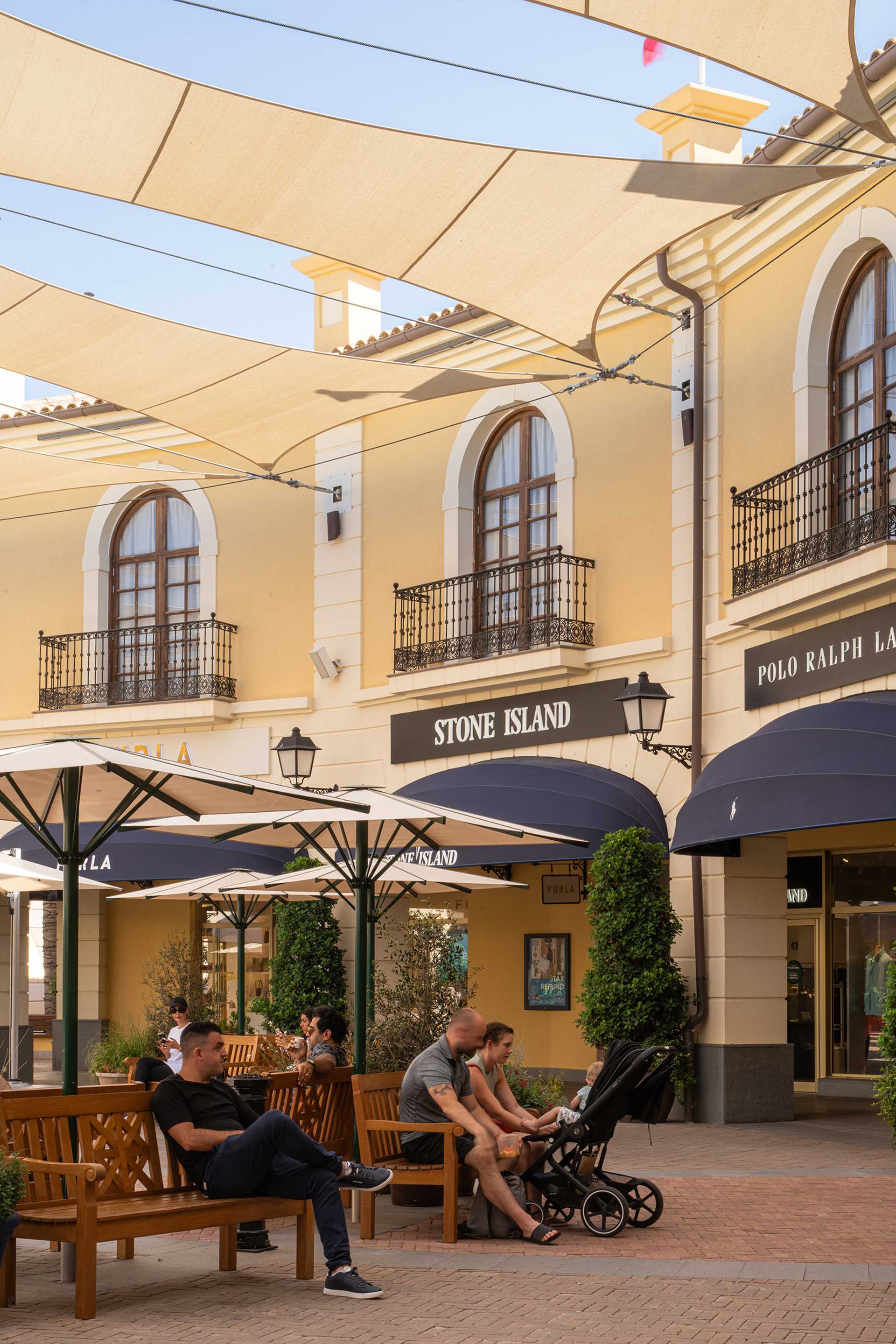 Visitors relaxing in the main square